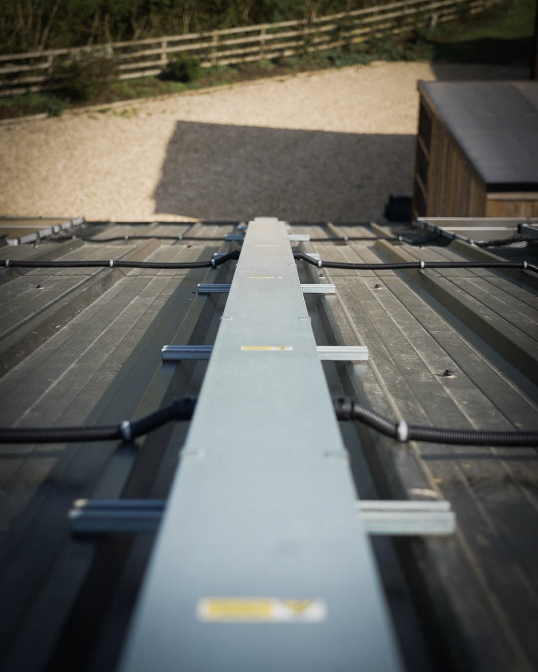 Mounting rail and DC cable management detail before panel installation