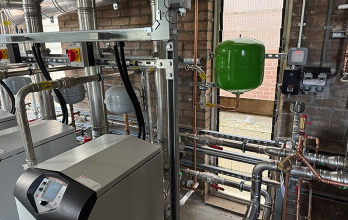 High-efficiency boiler with green expansion vessel and stainless pipework
